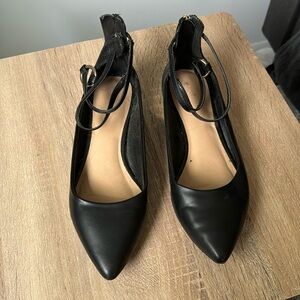 Black pointed flats
